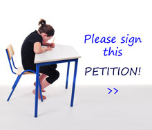 Child slumped over school desk