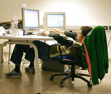 Very slouched posture at a desk