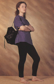Typical teenage pose, slumped and surly